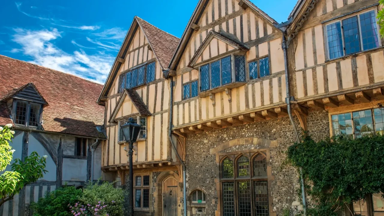 the priory gate and historic half timbered buildings in dome