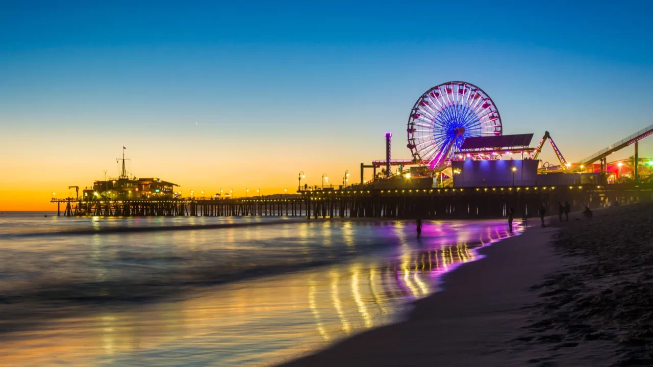 the santa monica pier at sunset in santa monica california
