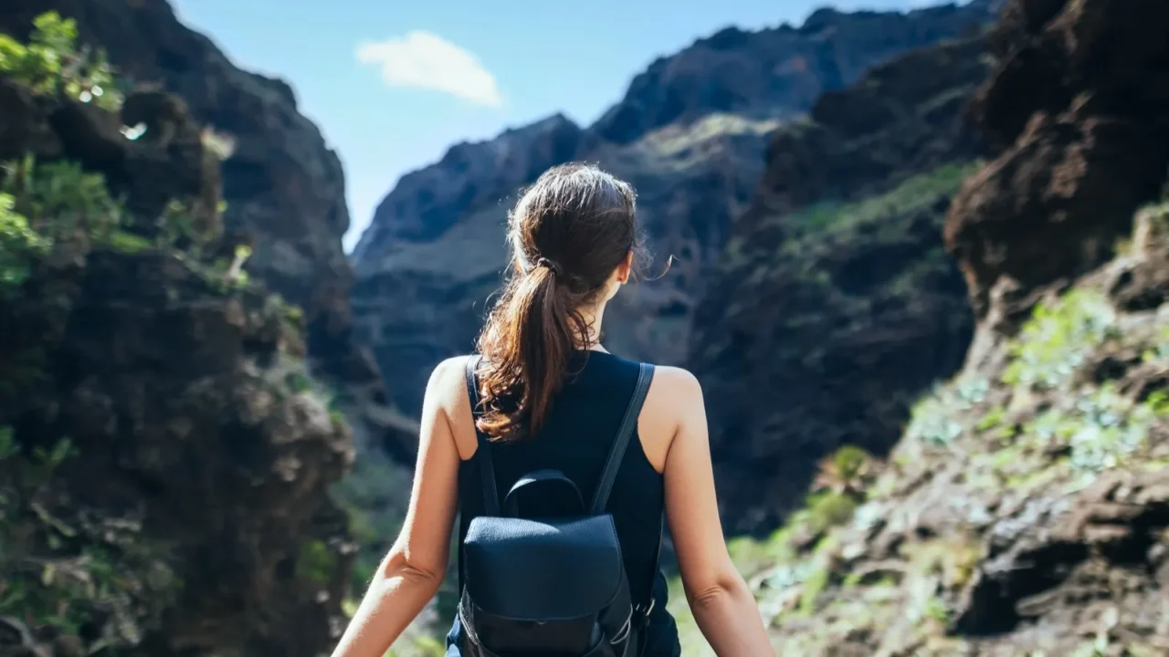 traveler woman enjoy picturesque mountains valley travel concept