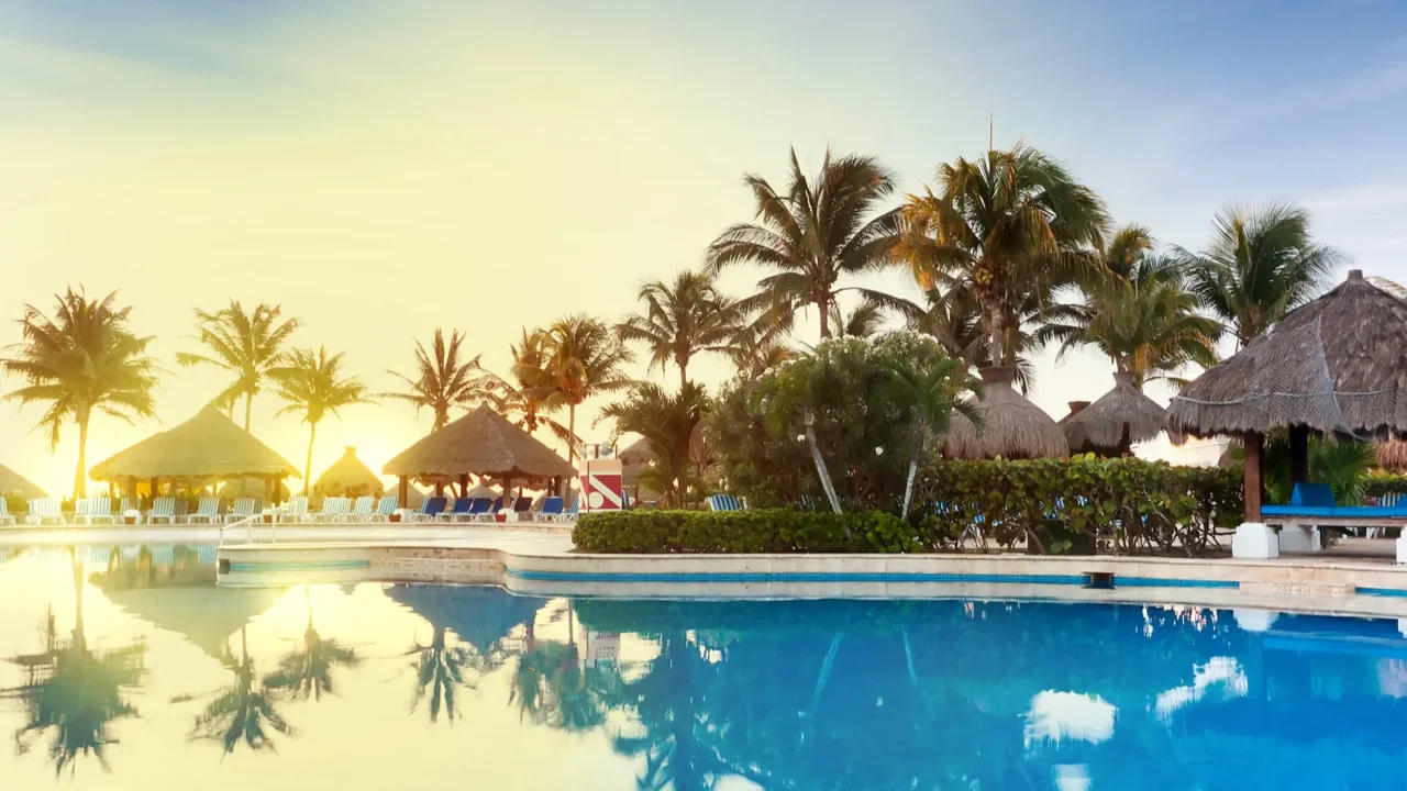 tropical swimming pool at sunrise
