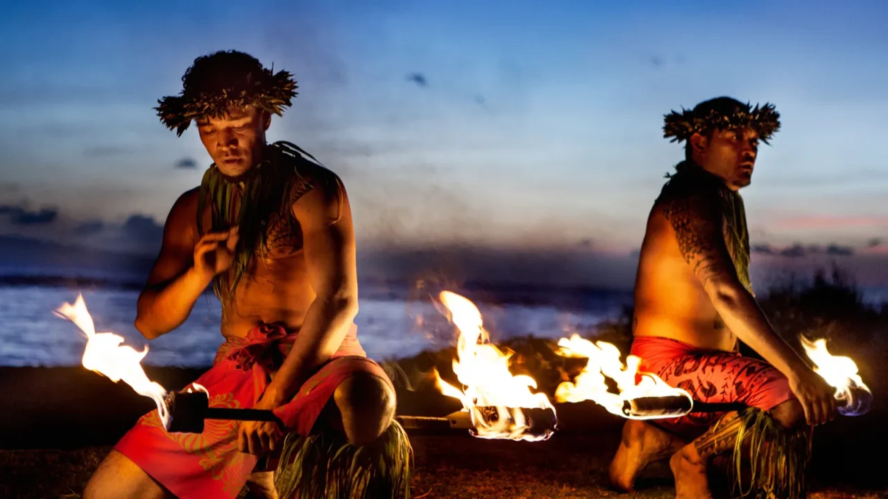 two hawaiian men ready to dance with fire