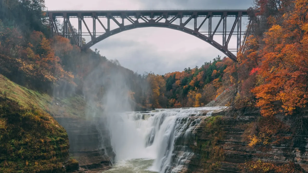upper falls and the portage viaduct with autumn color at