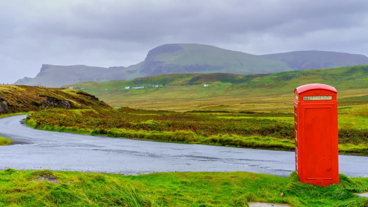 view of countryside landscape with a red phone box in