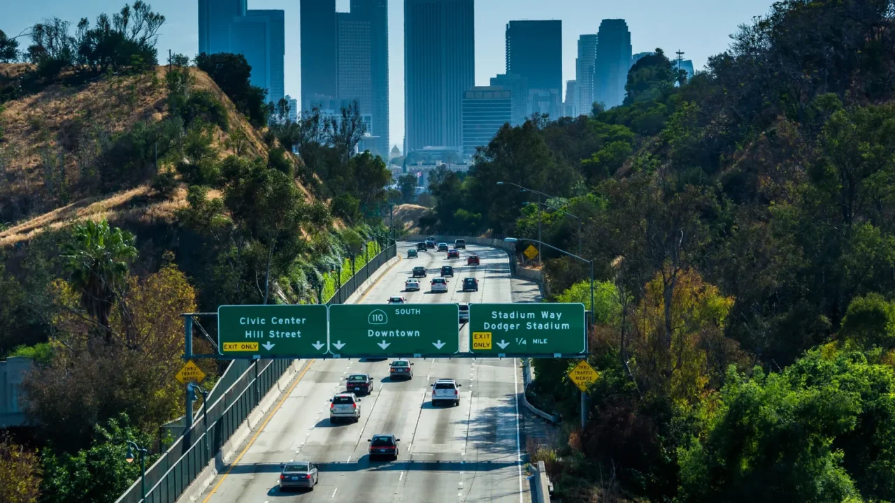 view of the 110 freeway and los angeles skyline from