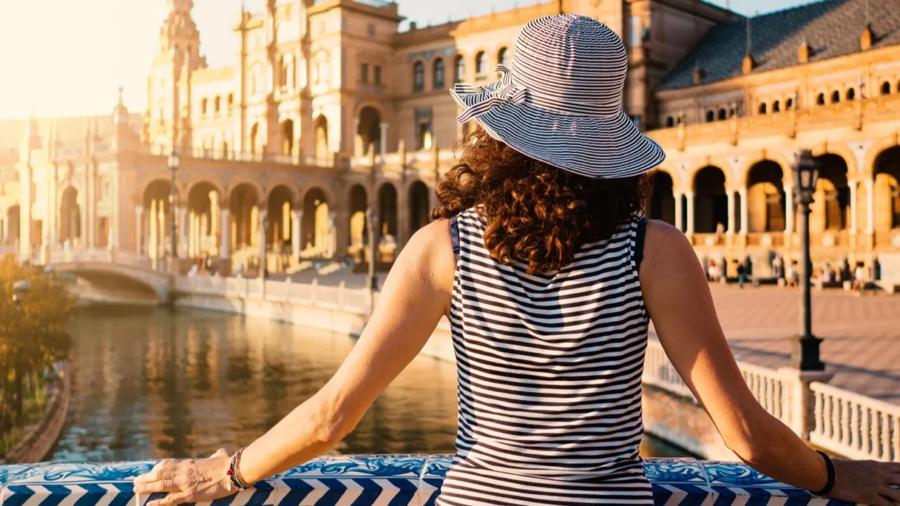 woman admiring plaza de espana spain square built on 1928