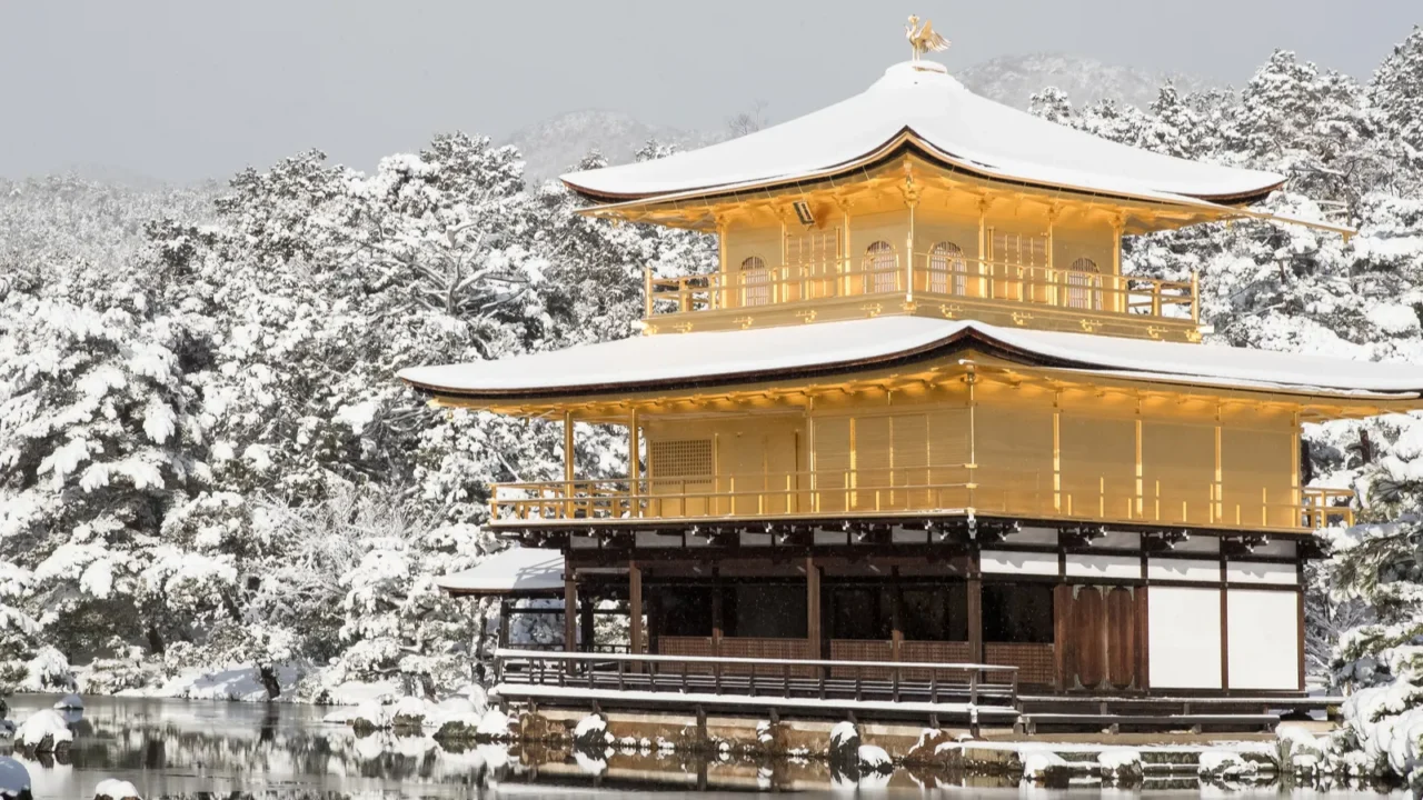 zen temple kinkakuji  golden pavilion  with snow fall