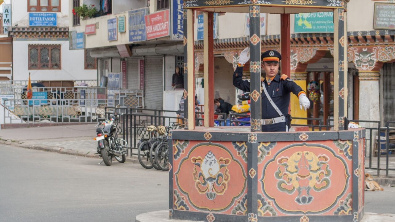Thimphu, Bhutan - november 2016: Local policemand directing the traffic in Thimphu downtown in Bhutan, as they refuse to get a traffic light