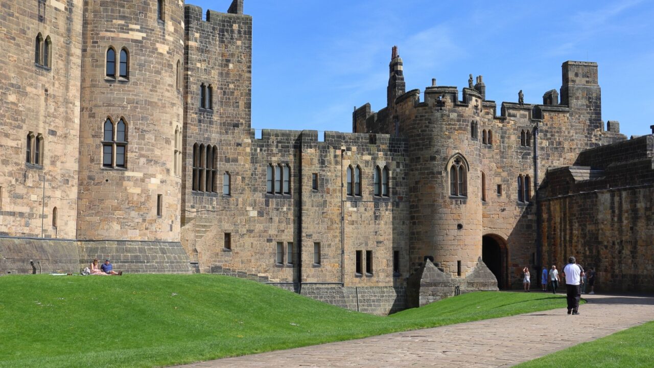 Northumberland, Northern England, United Kingdom - May 11, 2024: Alnwick Castle is a historic medieval castle famously featured in numerous films, including the Harry Potter series.