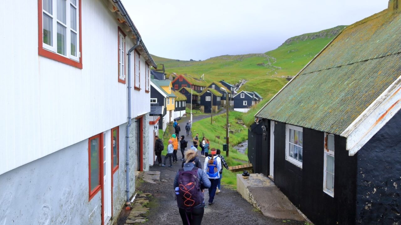 Mykines island, Faroe Islands, Denmark in Europe - August 25 2025: people enjoy the beautiful village and island of Mykines