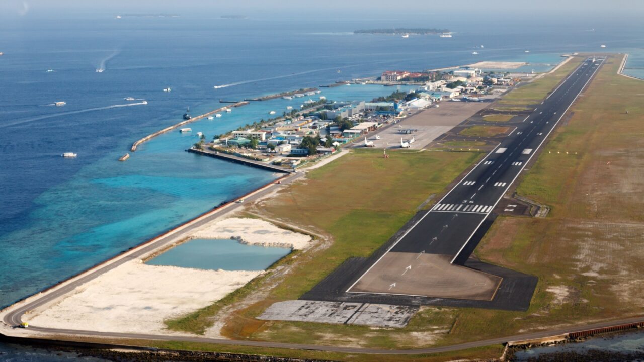 Hulhule Island - Male, Maldives - March 15, 2010: An air-view of the Maldive international airport from a seaplane landing at the seaplane airport near it.