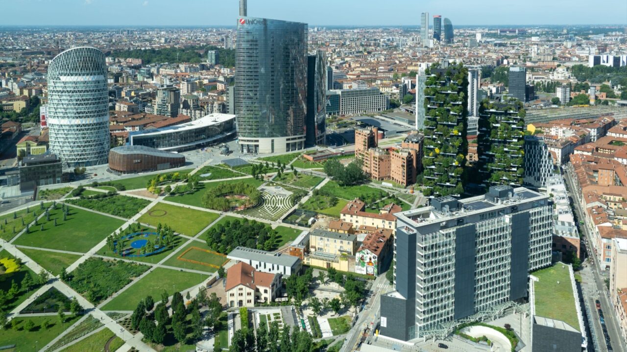 Milano, Italy. July 7, 2024. Amazing aerial landscape of the iconic Unicredit tower, UnipolSai tower, the Bosco Verticale and BAM public park. Super view of the Porta Nuova district