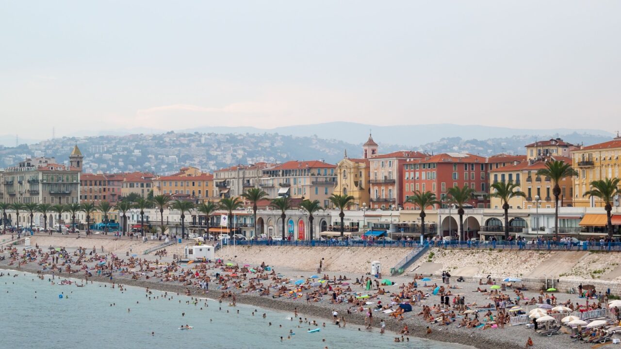 Nice/France-August 3, 2018 View of Promenade des Anglais Beach at sunset-The most famous stretch of beach in Nice,French riviera.