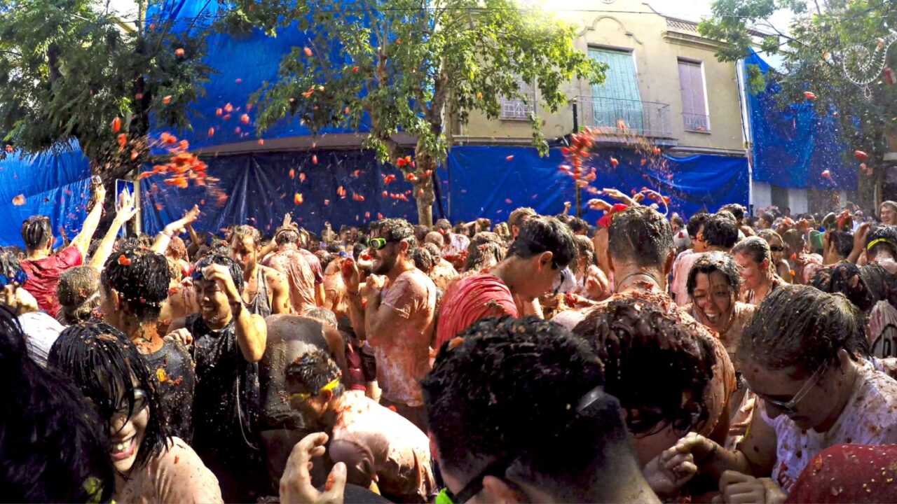 BUNOL, SPAIN - AUGUST 26: La Tomatina festival in August 26, 2015 in Bunol, Spain. Battle of tomatoes at street of city