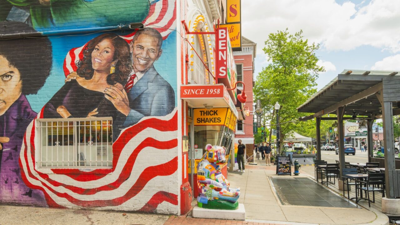 Washington D.C., USA, - May 23, 2025, mural of Barack and Michelle Obama adorns the side of Ben’s Chili Bowl, adding to the vibrant U Street scene.