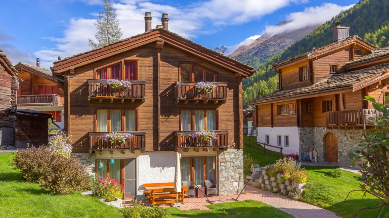 Zermatt’s wooden chalets line cobblestone streets filled with flowers and balconies.