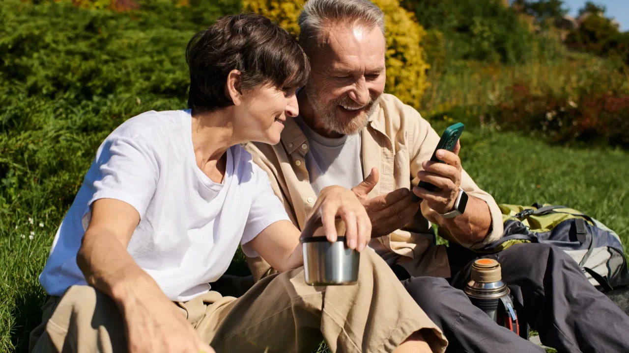 a joyful senior couple takes a moment to relax during