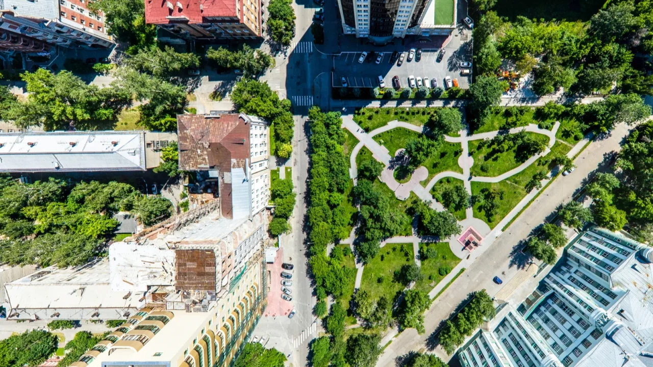 aerial city view with roads houses and buildings