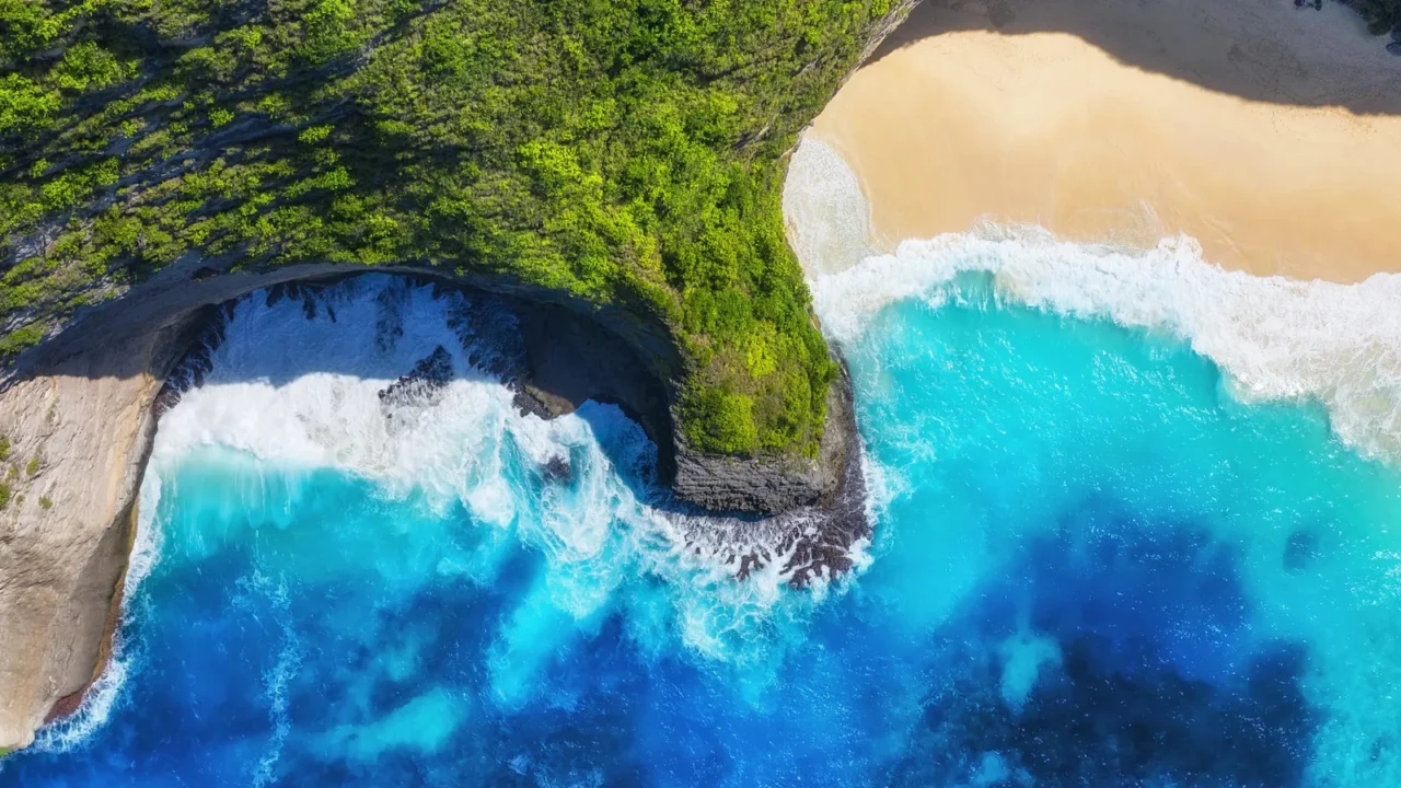 aerial view at sea and rocks turquoise water background from