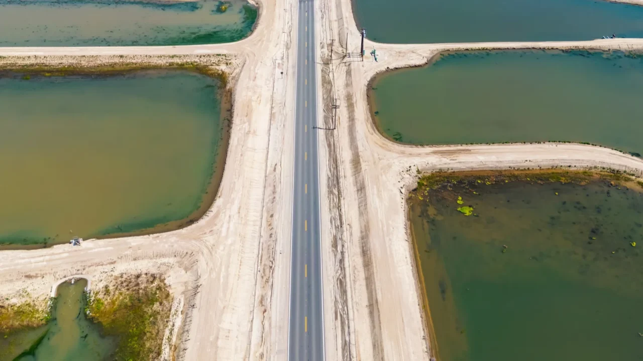 aerial view of colorful irrigation tanks to harvest fields at
