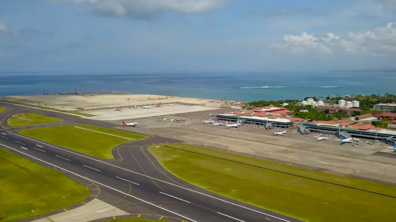 airplane parked on ngurah rai airport apron aerial view to
