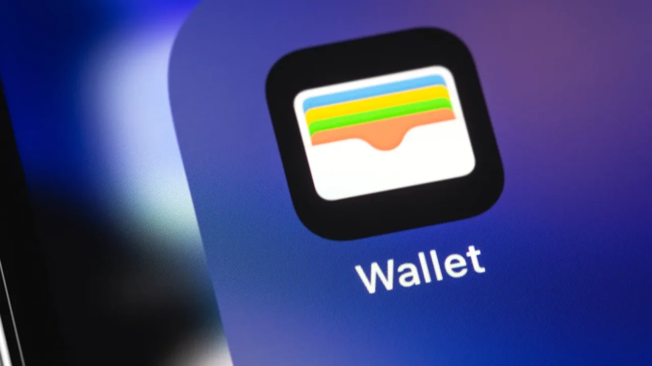 Apple Wallet mobile app on the screen iPhone closeup.