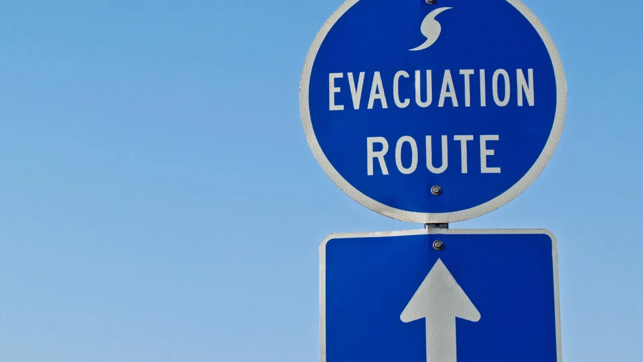 blue hurricane evacuation route sign along a highway