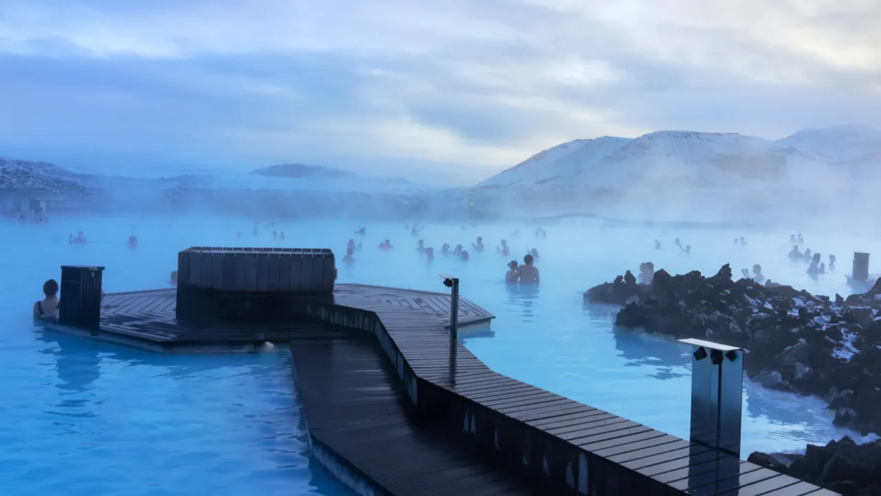 blue lagoon next to reykjavik with people bathing in this