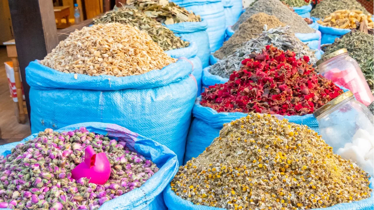 blue sacks with aromatic herbs in the market of marrakech