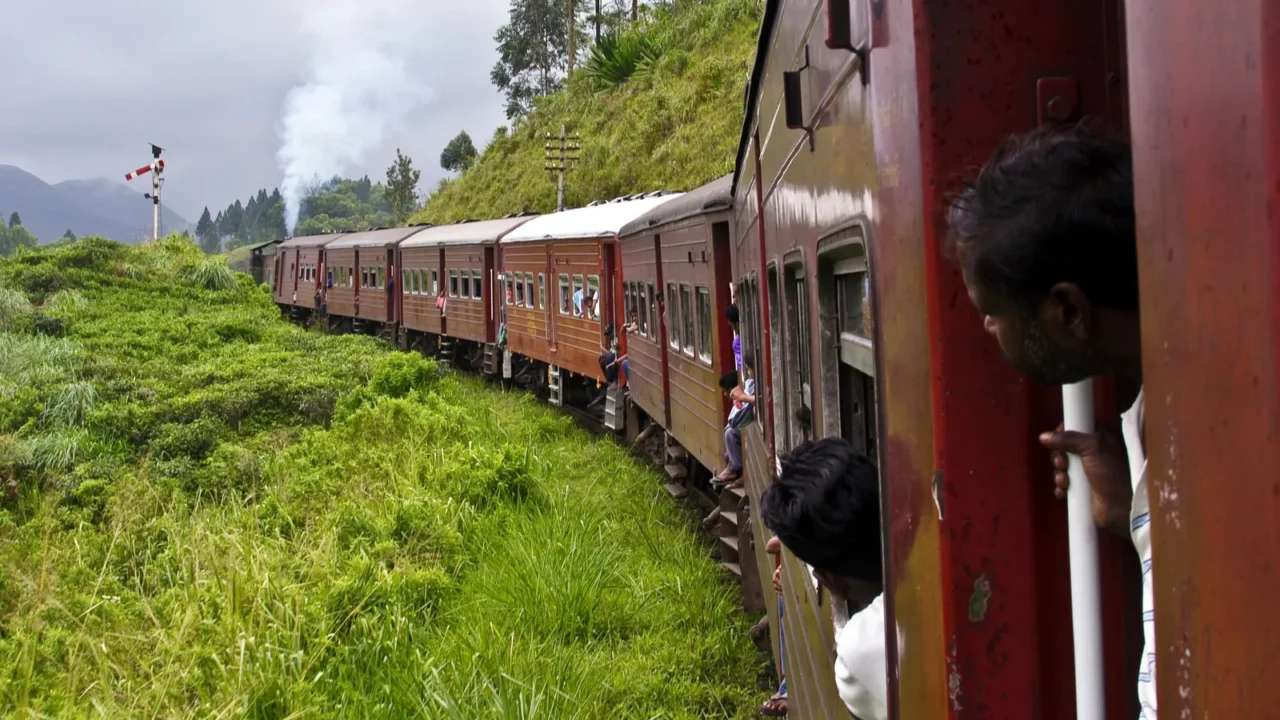 boy looking out of the railway in scenic landscape in