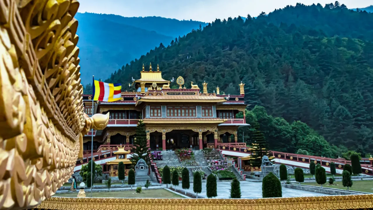 buddhist monastery at himalayan mountain foothills at morning from unique