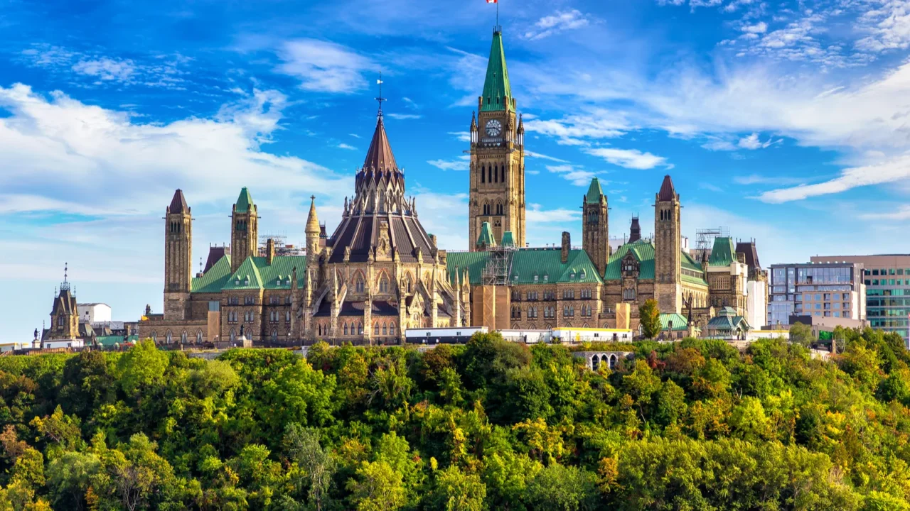 canadian parliament in ottawa and river in a sunny day