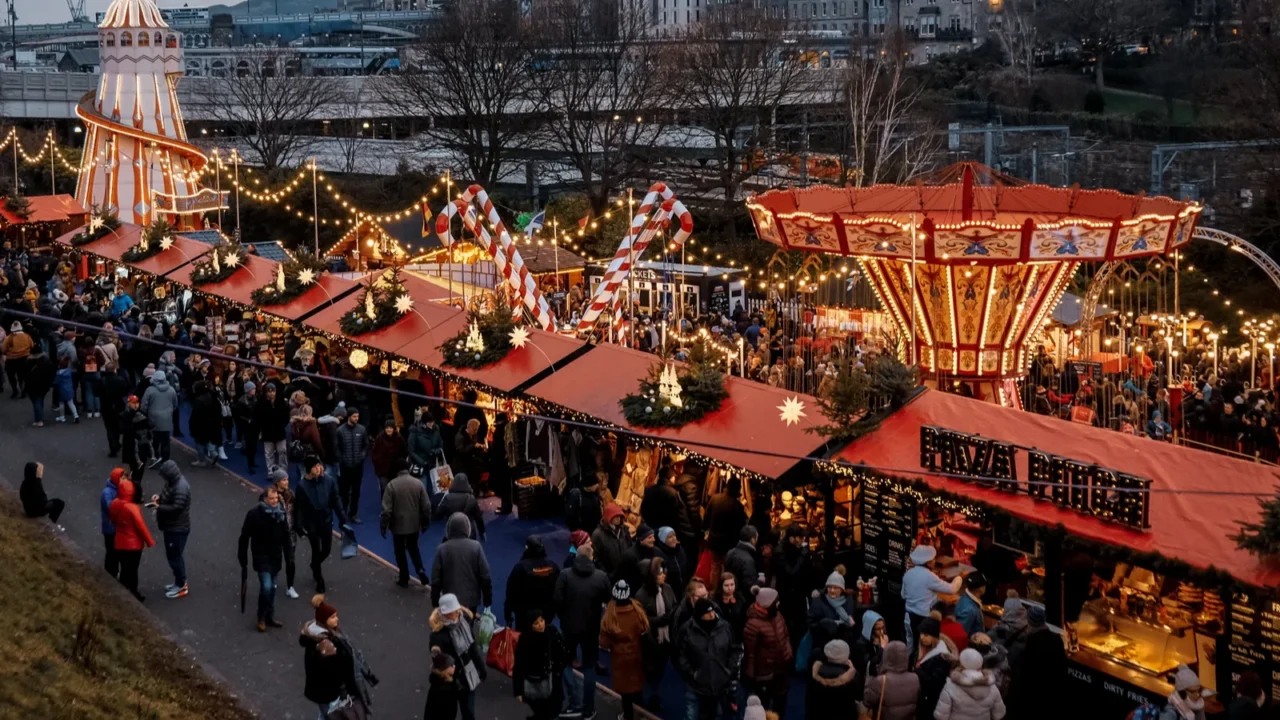 christmas market around scott monument in the city of edinburgh