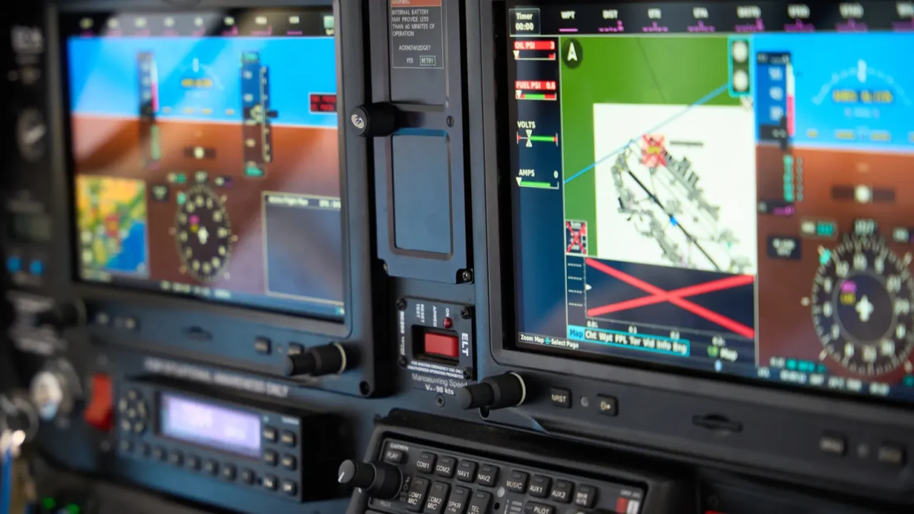 closeup view of a modern aircraft cockpit featuring multiple digital