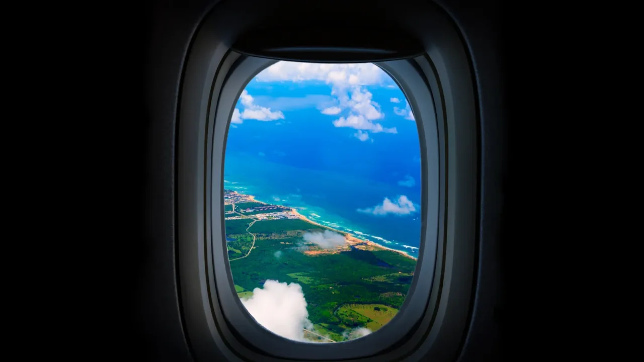 costline sea and sky from the planes window