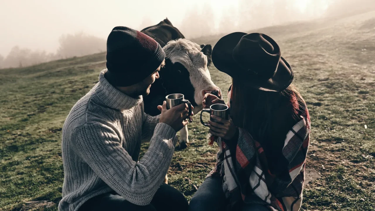 couple enjoying autumn morning on valley