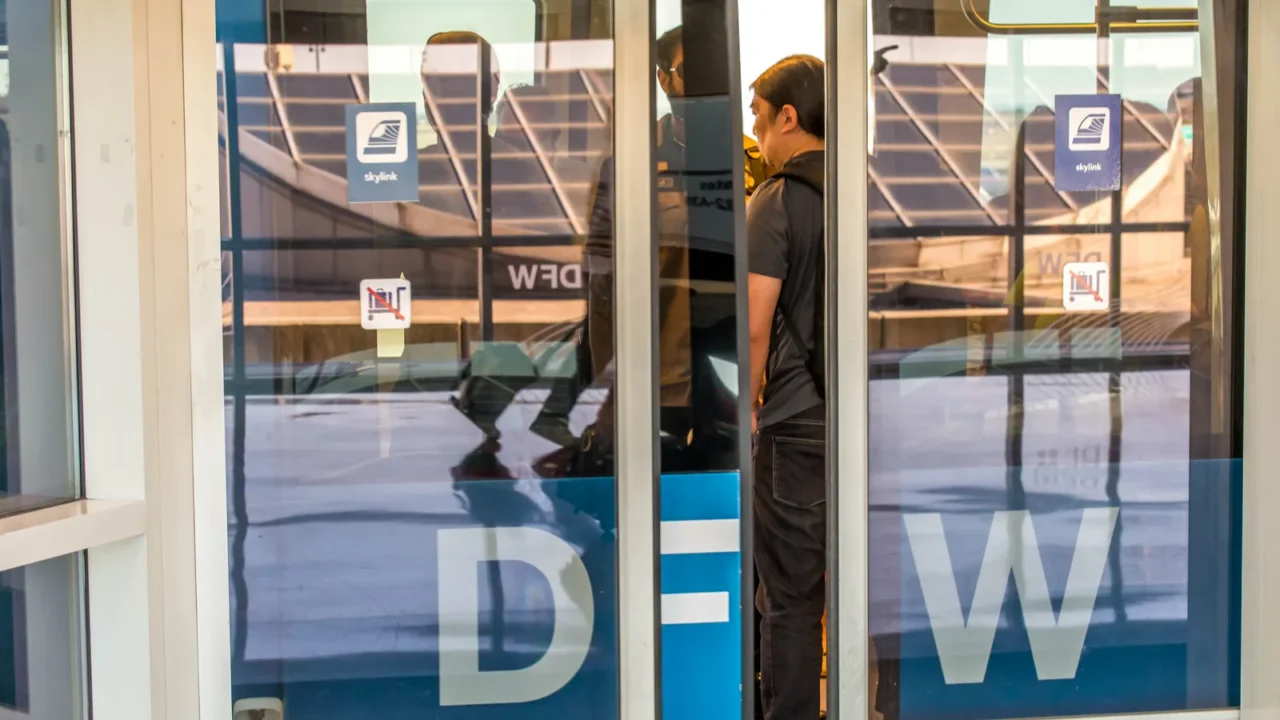 dfw airport  passengers in the skylink station