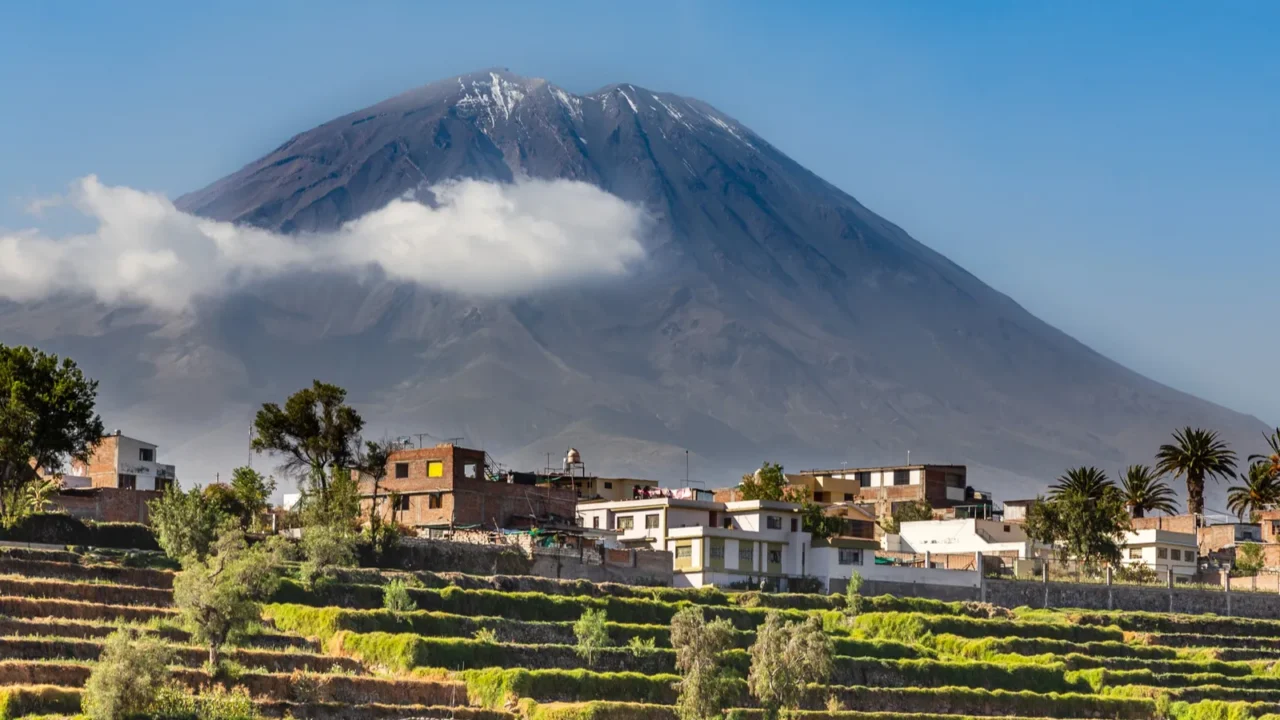 dormant misti volcano over the fields and houses of peruvian