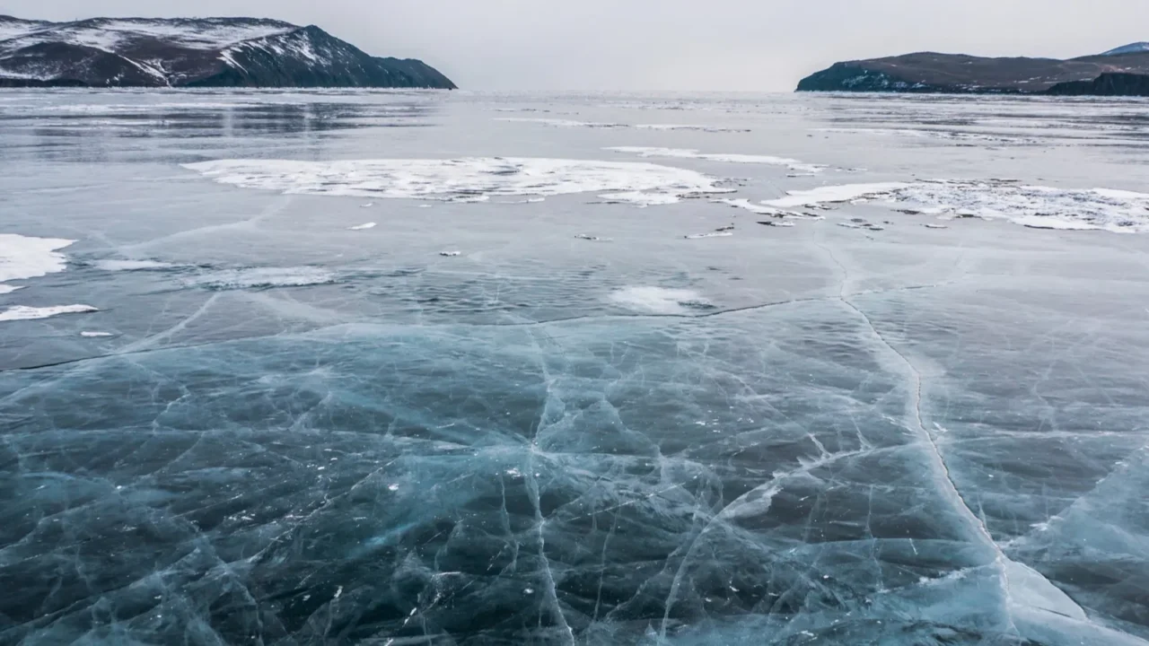 frozen river and mountains