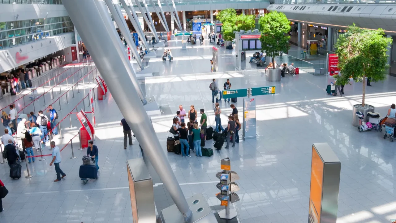interior of modern international airport no recognizable faces and advertising
