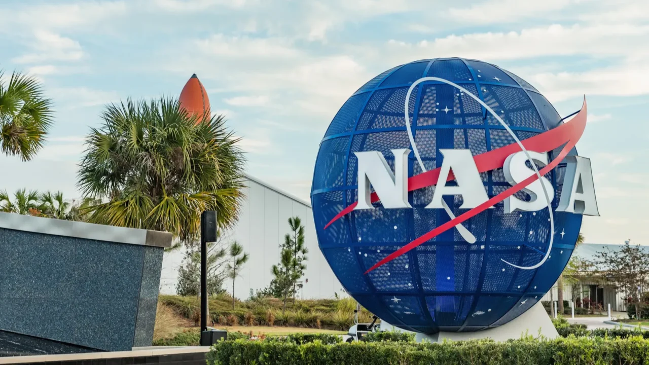 NASA logo on mock Globe on input to NASA Kennedy Space Center, Apollo Saturn V Center at Kennedy Space Center, Orlando, Florida.