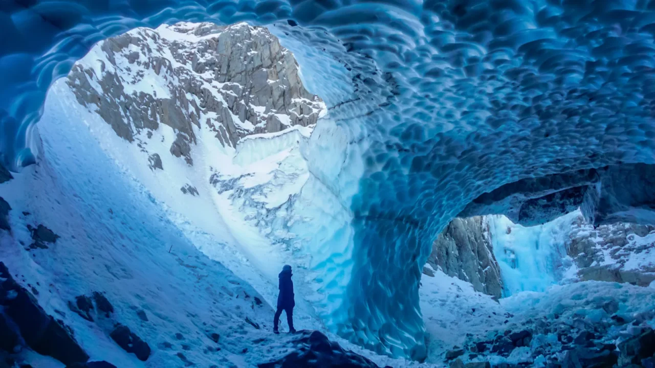 man inside an ice cave