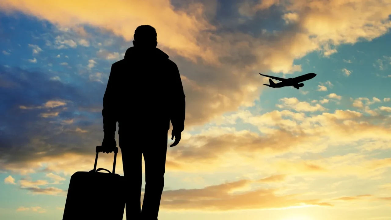 man with travel suitcase