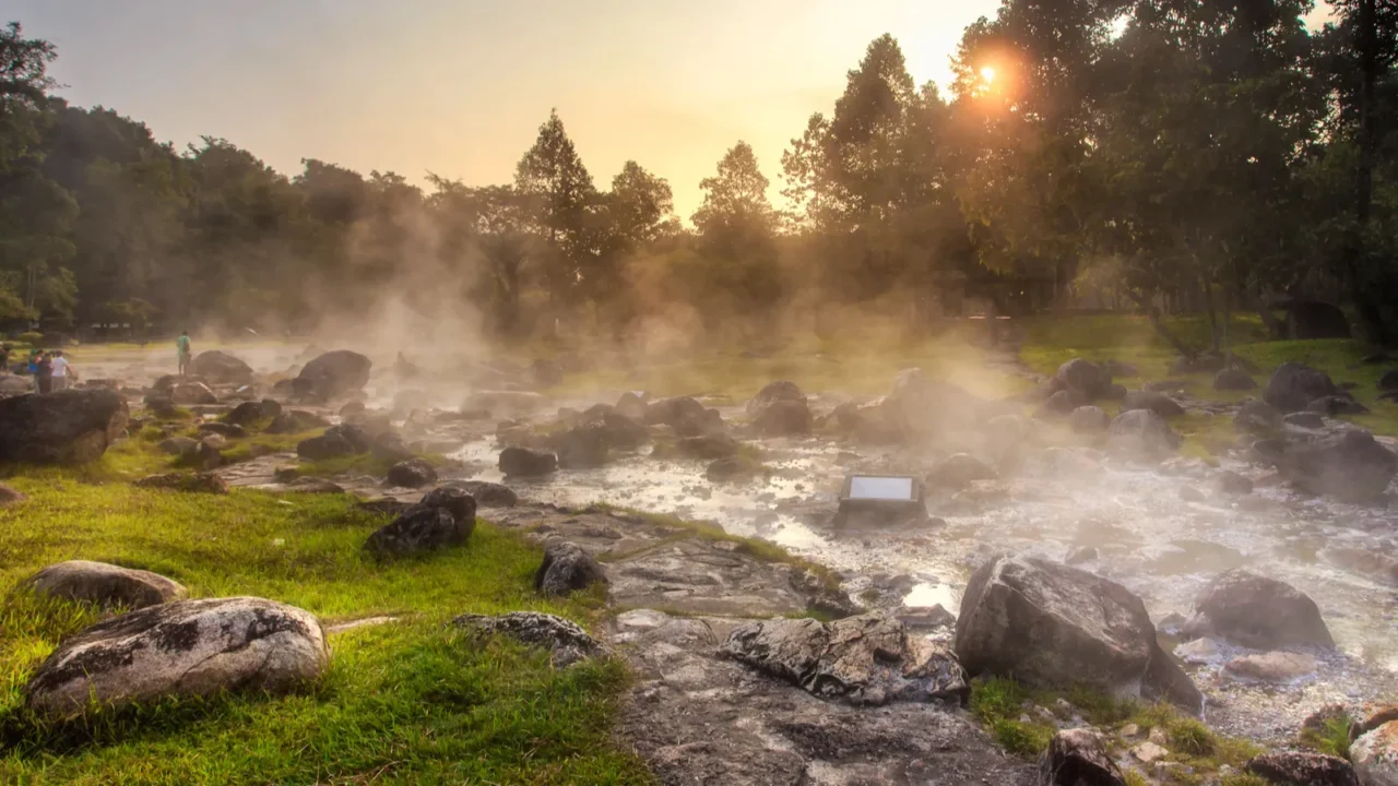 mineral hot water in hot springs and morning fog background