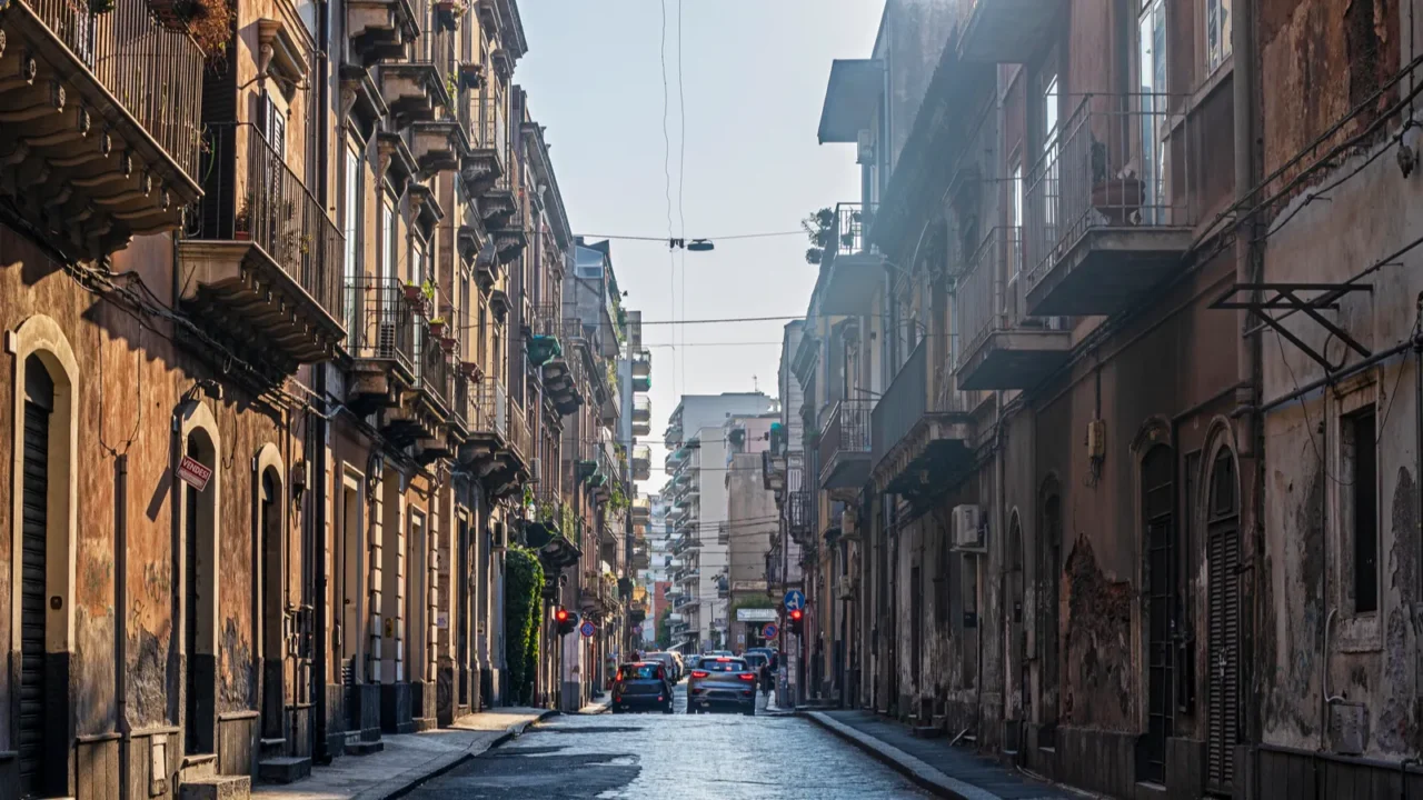 narrow street with ancient architecture in a big city