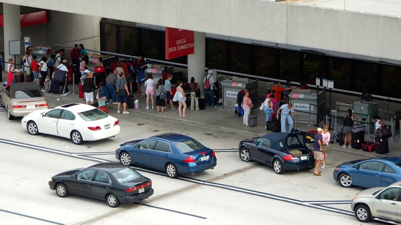 passenger arriving at airport terminal