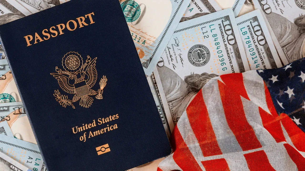patriotic american passport on top of a pile of one