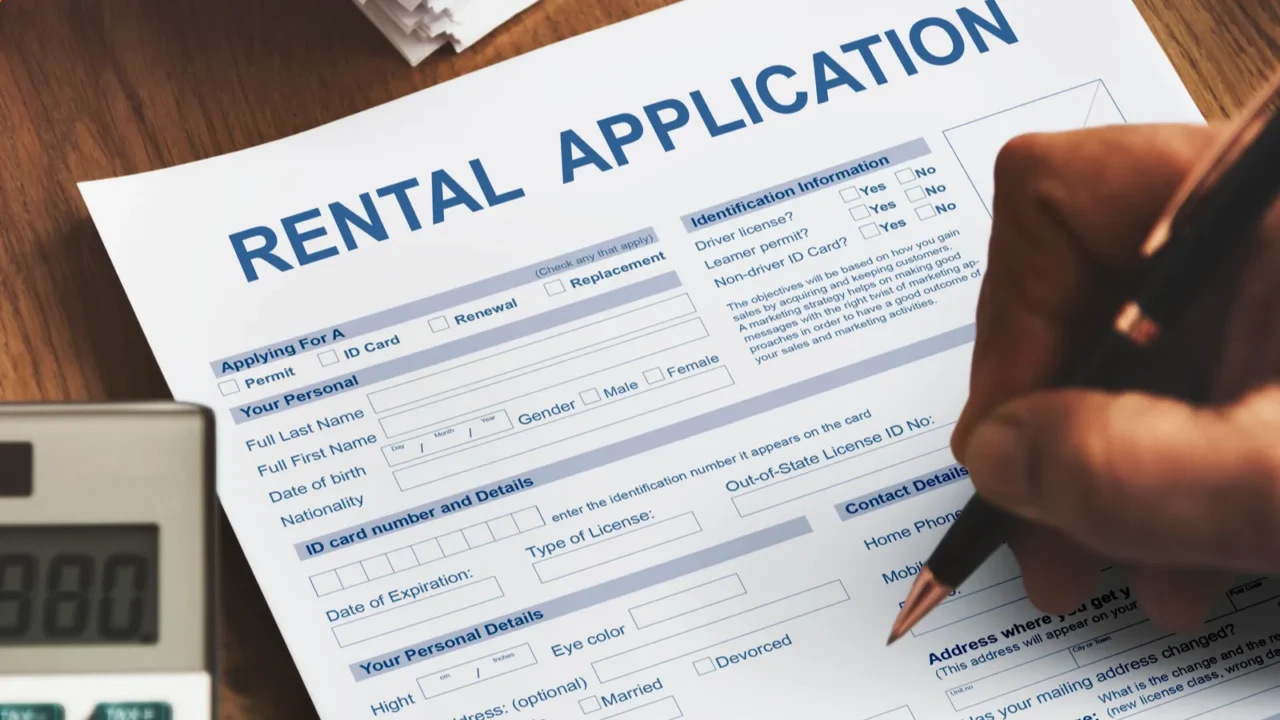 person filling application form