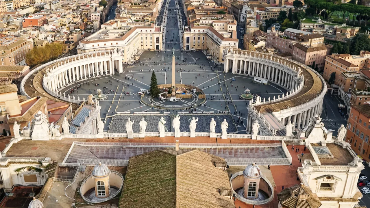 piazza san pietro with historical buildings in vatican city