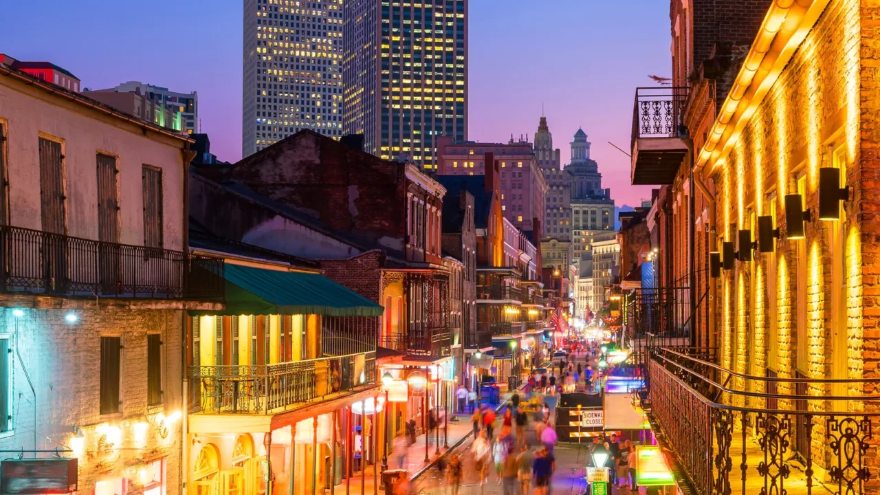 pubs and bars with neon lights in the french quarter