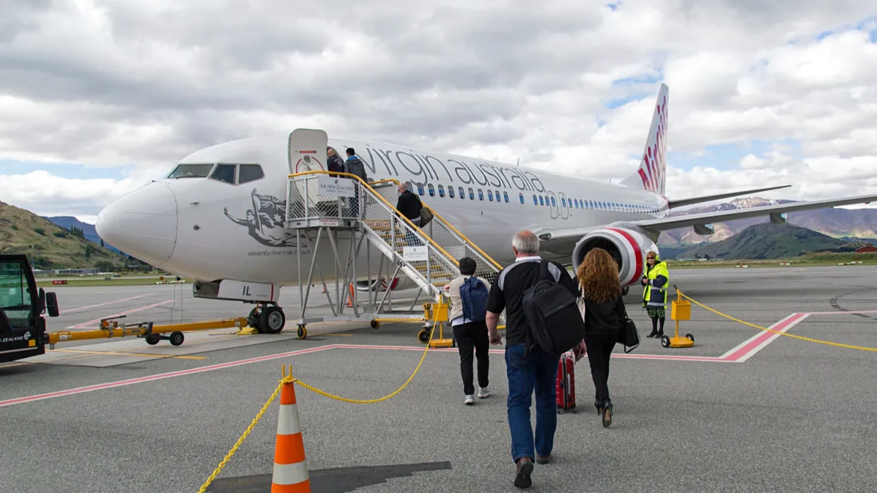 queenstown new zealand october 23 2015 passengers board a virgin